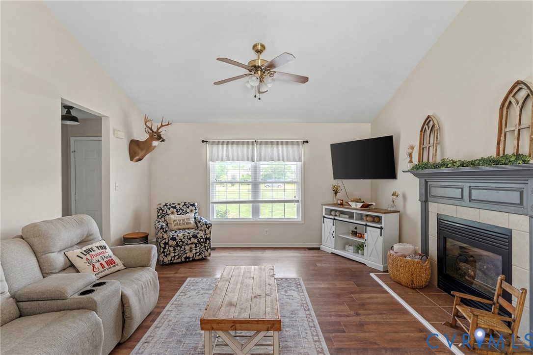 64 Edwards Court Dutton, VA 23050 - Photo 6 of 27 Spacious living area featuring vaulted ceilings, w