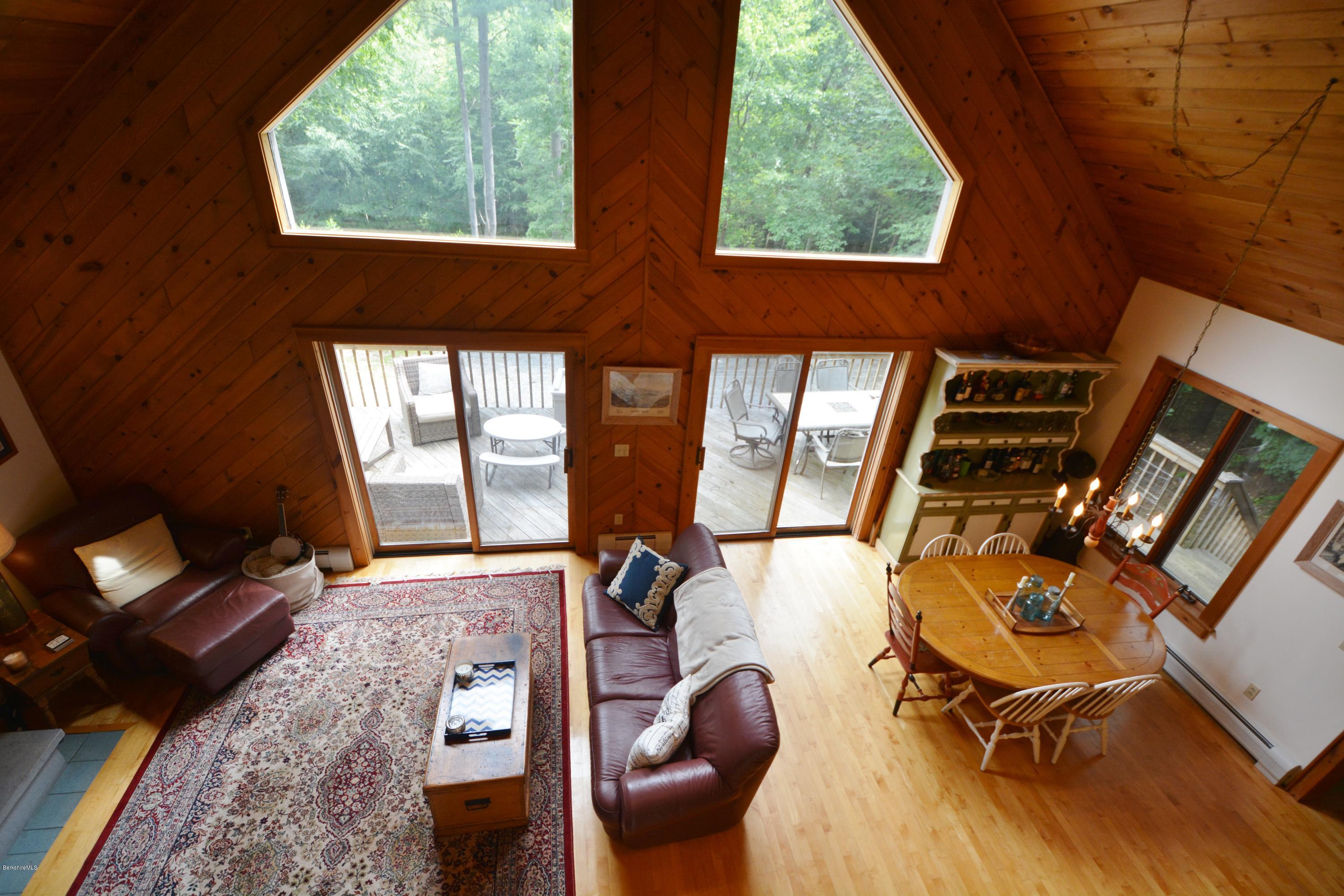 70 Rainbow Road Otis, MA 01029 - Photo 9 of 18 a view of a livingroom with furniture and a window