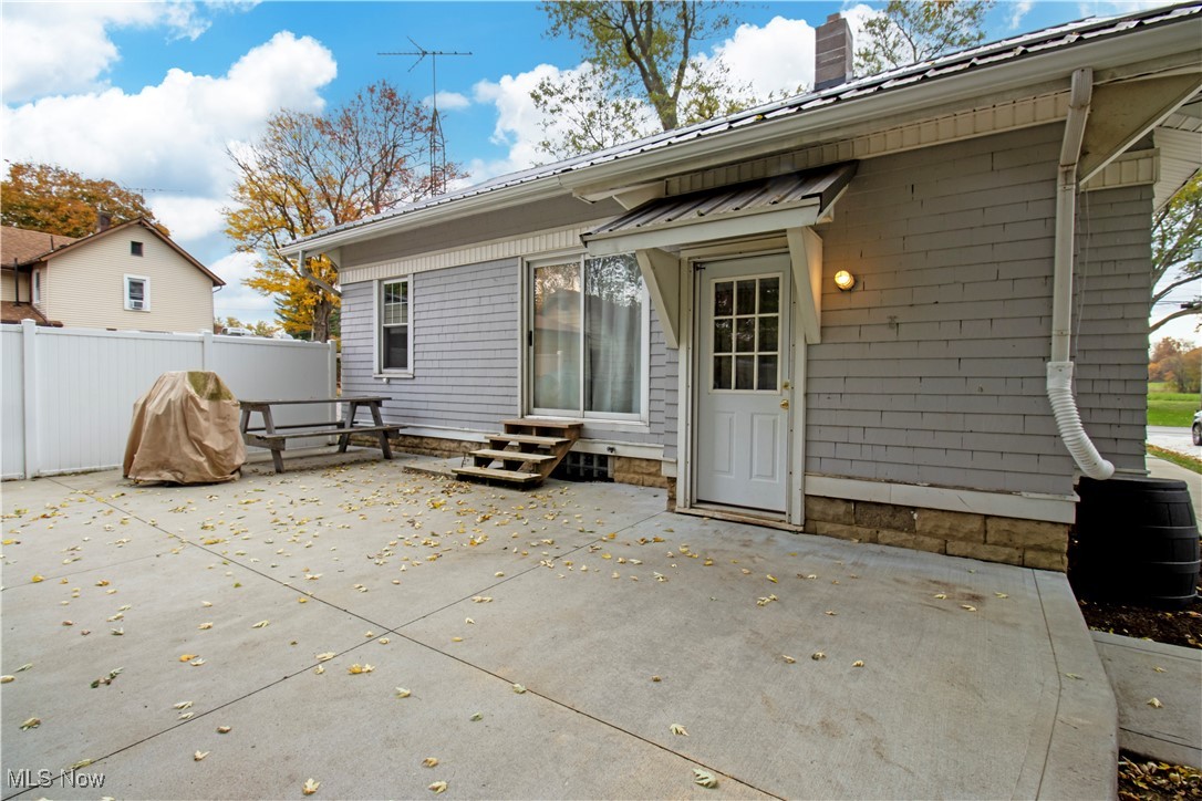 5699 Massillon Road Dalton, OH 44618 - Photo 3 of 24 Back of house featuring a patio