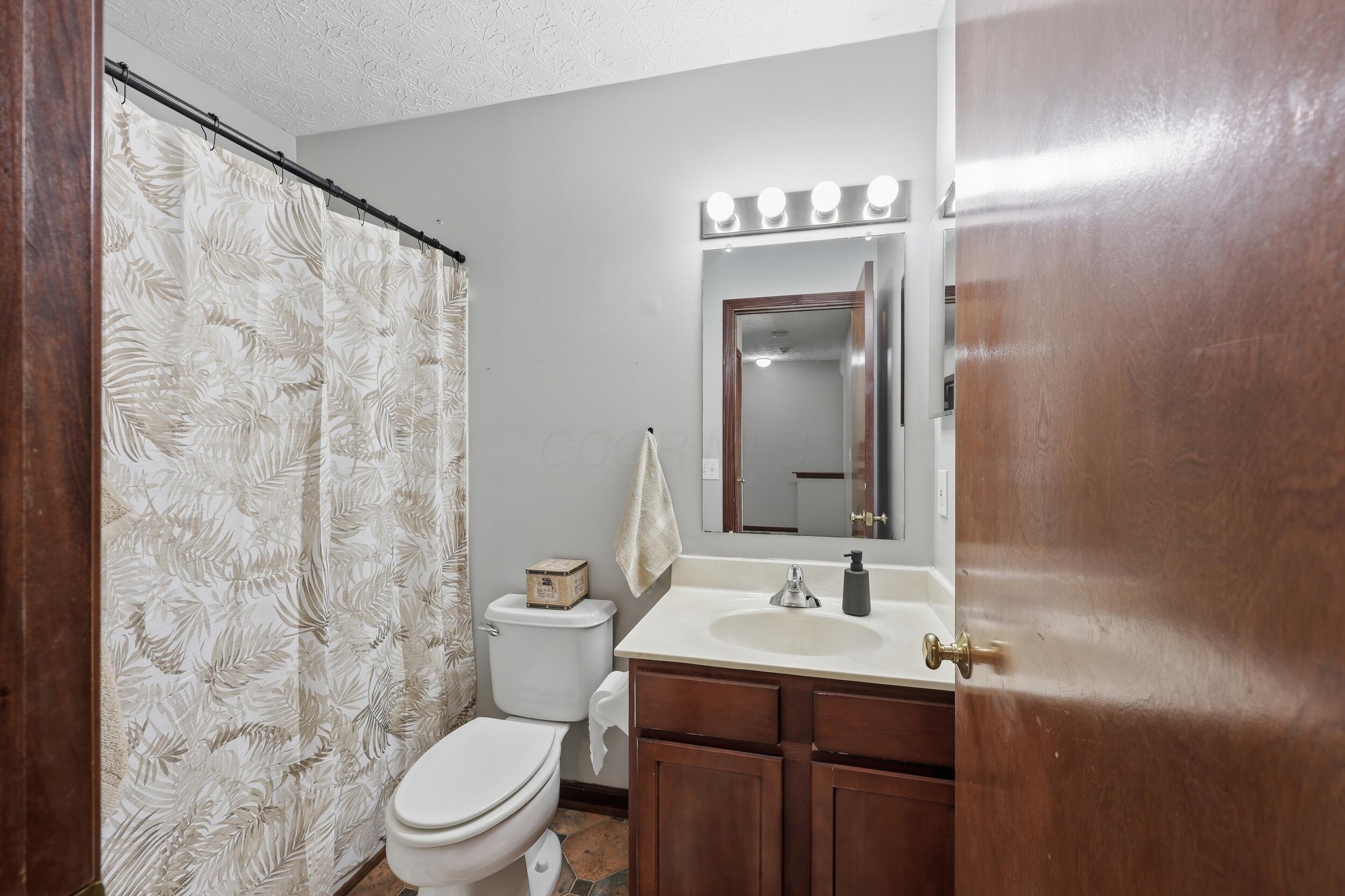 4553 Nickerson Road Columbus, OH 43228 - Photo 20 of 37 Hall bathroom