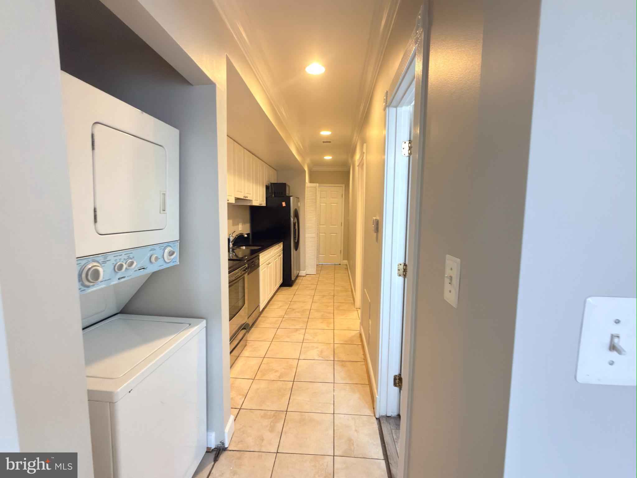 1246 Queen Street Northeast, Unit 2 Washington, DC 20002 - Photo 5 of 23 a view of a hallway with furniture