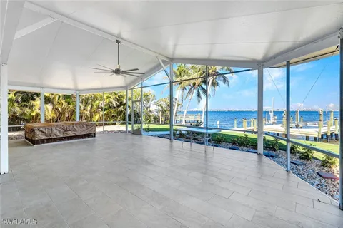 a view of a swimming pool with a chair