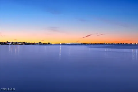 a view of a swimming pool with an ocean view