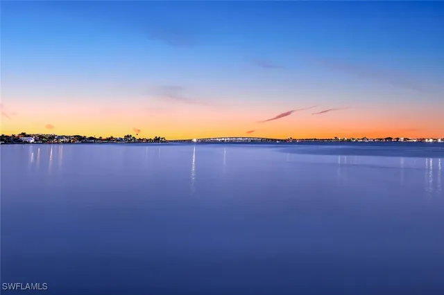 a view of a swimming pool with an ocean view