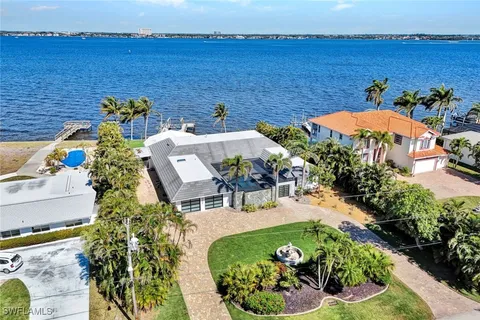 a view of a terrace with chairs and a table