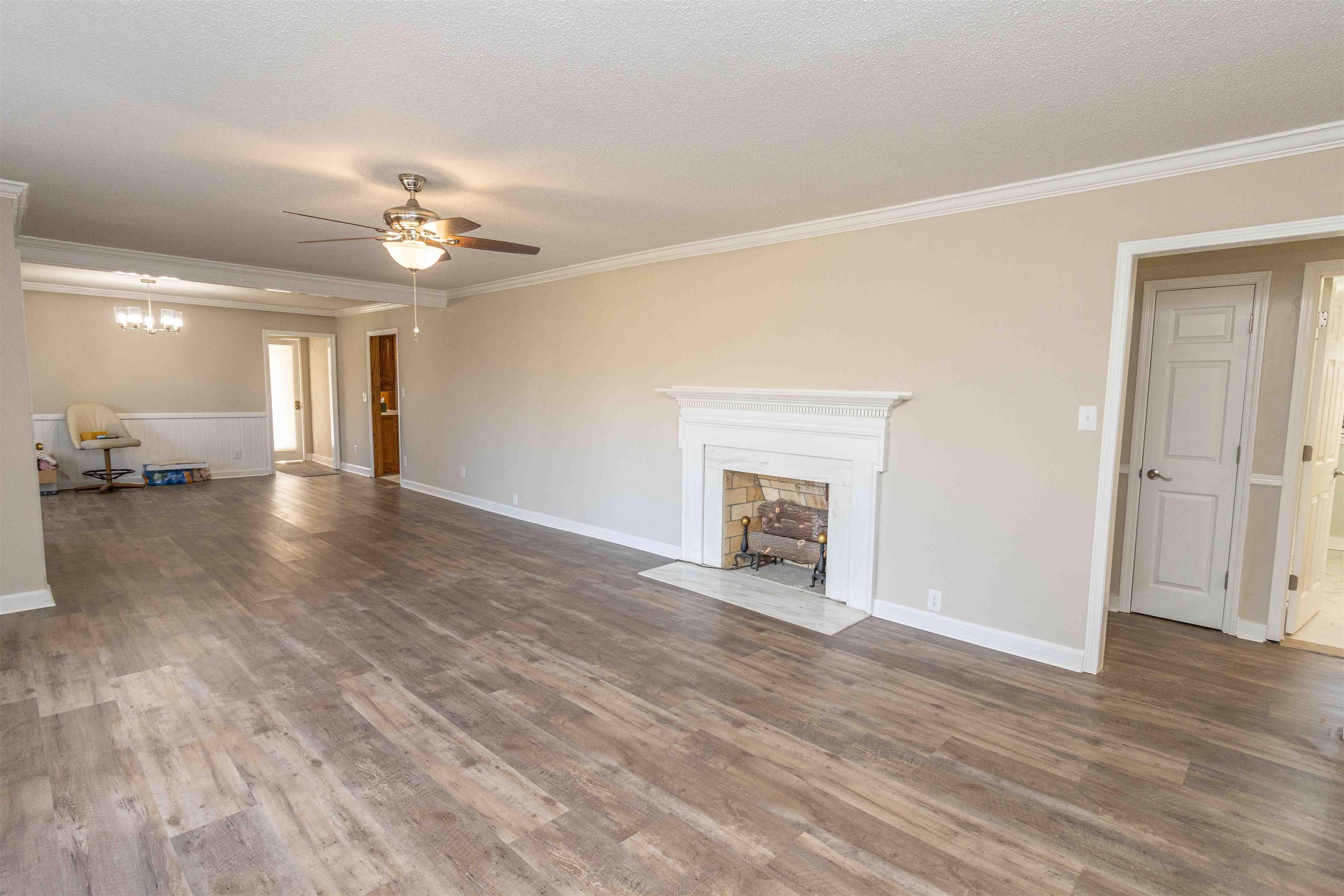 8453 Highway 45 Ramer, TN 38367 - Photo 11 of 40 wooden floor in an empty room with a window