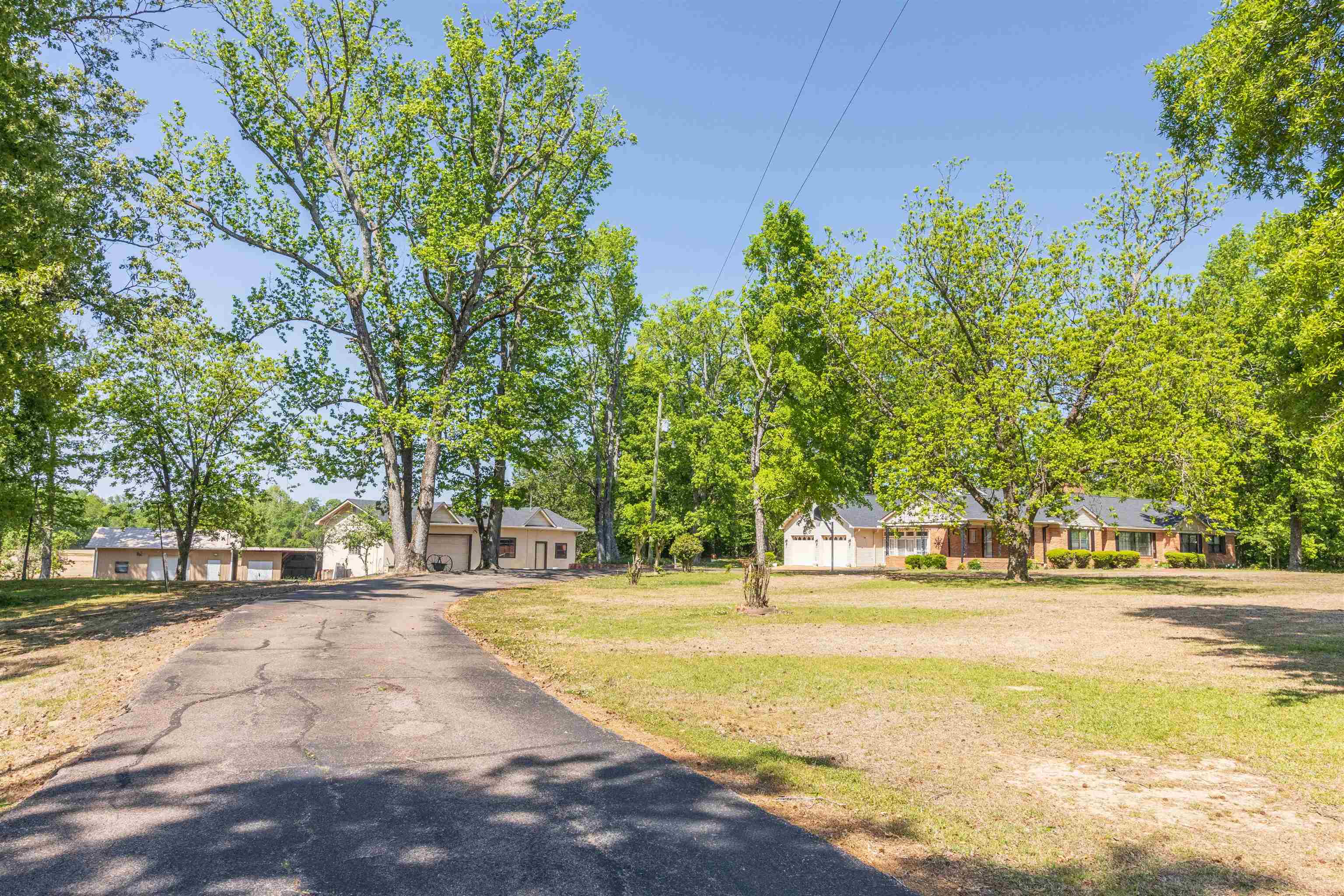 8453 Highway 45 Ramer, TN 38367 - Photo 2 of 40 a building with trees in front of it