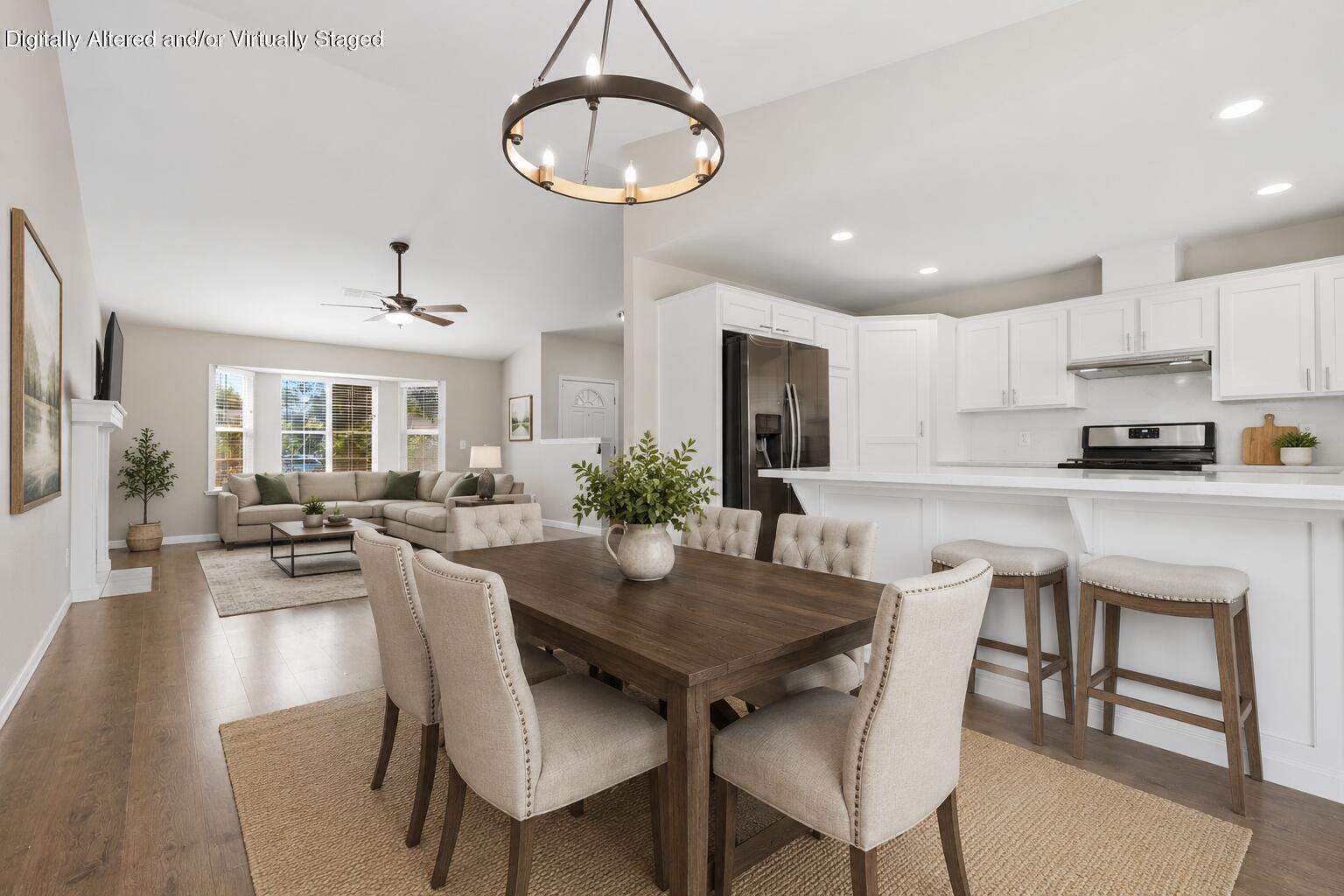 481 Katelyn Court Exeter, CA 93221 - Photo 15 of 37 a view of a dining room with furniture window and wooden floor