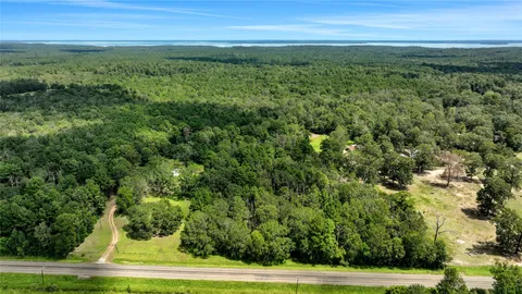 a view of a yard with an outdoor space