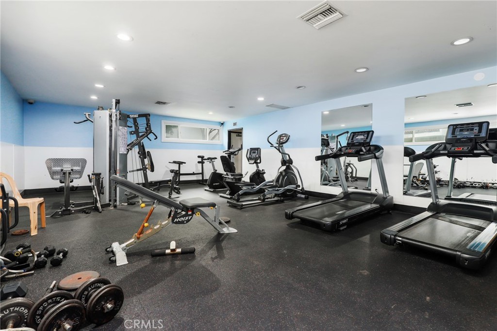 12200 Montecito Road, Unit D301 Seal Beach, CA 90740 - Photo 25 of 32 a view of a room with gym equipment