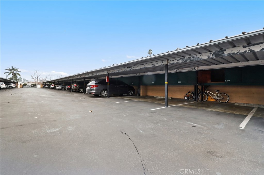 12200 Montecito Road, Unit D301 Seal Beach, CA 90740 - Photo 32 of 32 a view of outdoor space with garage