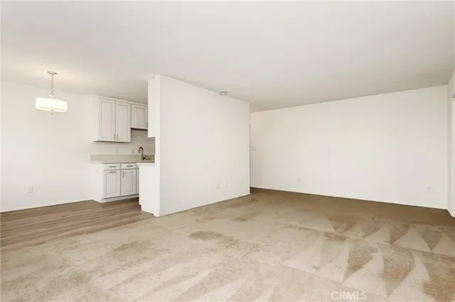 a view of a kitchen with a sink