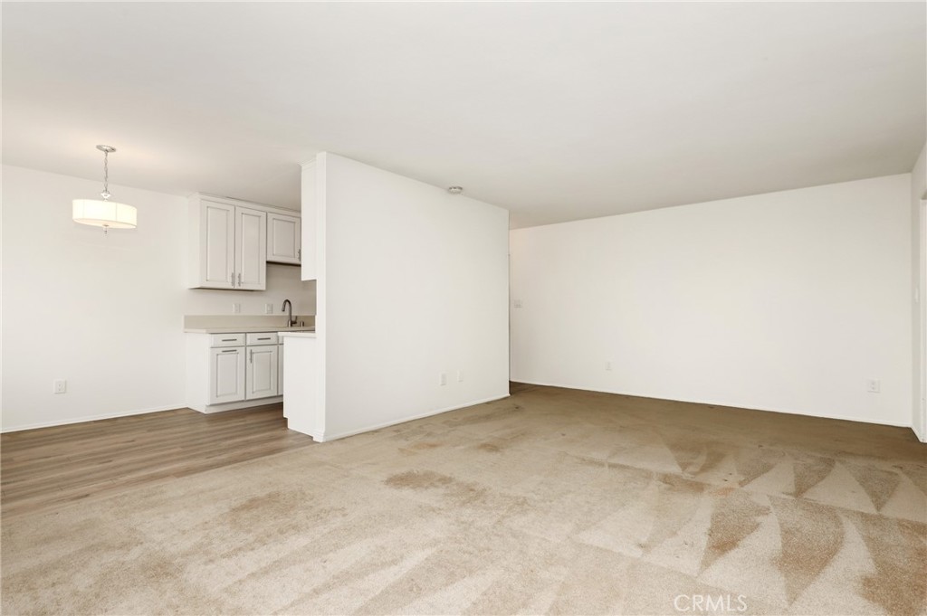 12200 Montecito Road, Unit D301 Seal Beach, CA 90740 - Photo 5 of 32 a view of a kitchen with a sink