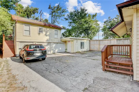 a car parked in front of a house