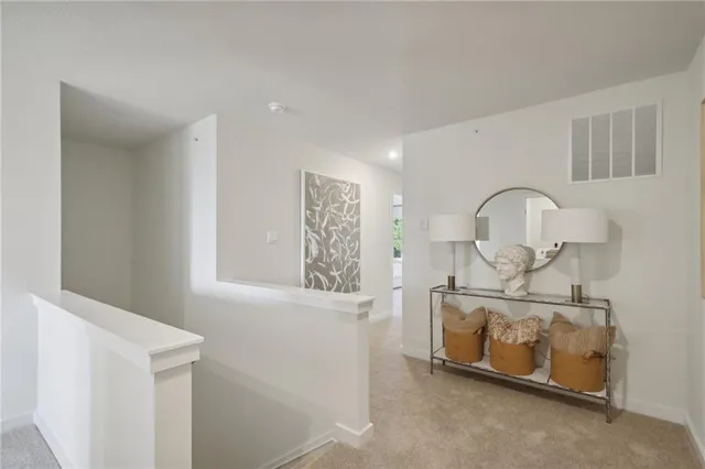 a view of a room that has washer and dryer