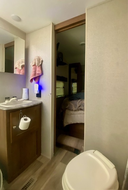 2-131 Woodhaven Sublette, IL 61367 - Photo 20 of 31 a bathroom with a toilet and a sink