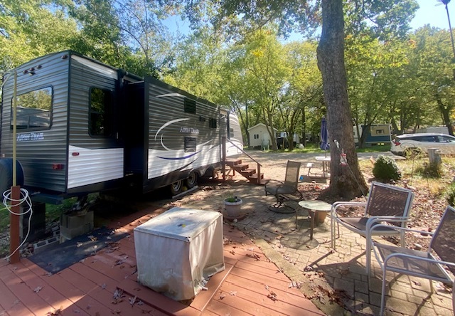2-131 Woodhaven Sublette, IL 61367 - Photo 2 of 31 a view of backyard with outdoor seating and trees