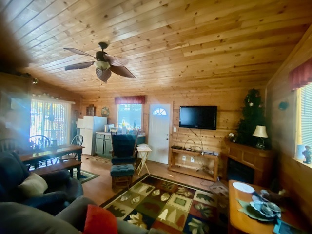 2-131 Woodhaven Sublette, IL 61367 - Photo 25 of 31 a living room with furniture and a flat screen tv
