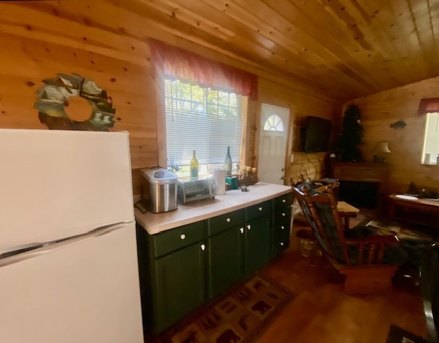2-131 Woodhaven Sublette, IL 61367 - Photo 29 of 31 a kitchen with a refrigerator and a table