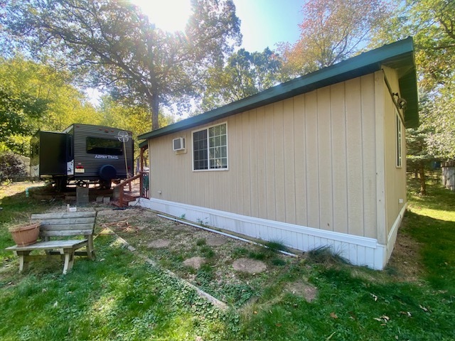 2-131 Woodhaven Sublette, IL 61367 - Photo 6 of 31 a backyard of a house with table and chairs