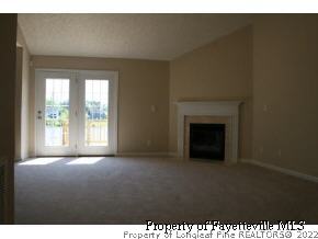 1932 Nuthatch Road Fayetteville, NC 28304 - Photo 5 of 9 a living room with a fireplace