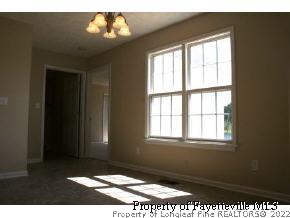 1932 Nuthatch Road Fayetteville, NC 28304 - Photo 6 of 9 a view of an empty room and window
