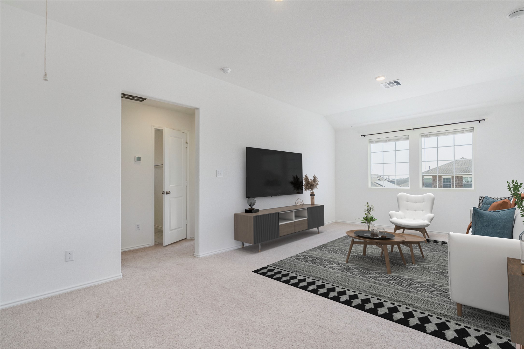 1937 Guntersville Bend Leander, TX 78641 - Photo 13 of 38 a living room with furniture and a flat screen tv
