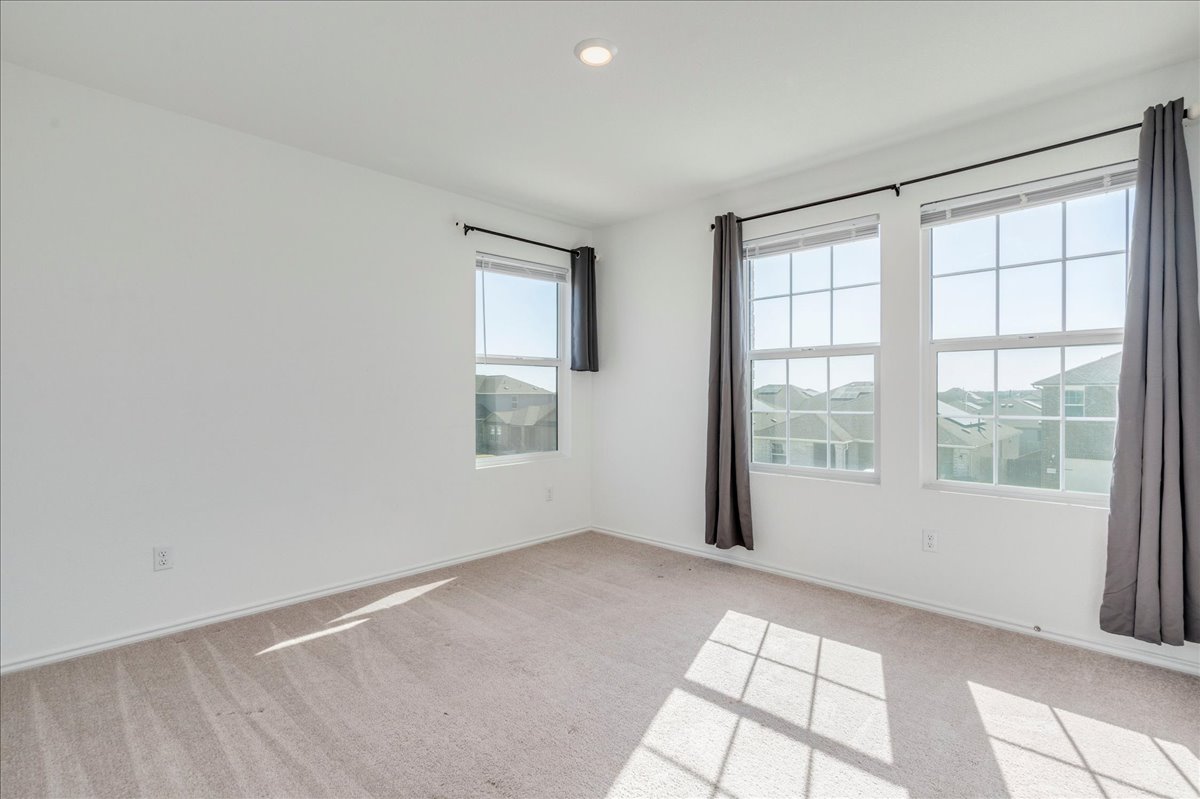 1937 Guntersville Bend Leander, TX 78641 - Photo 31 of 38 an empty room with windows