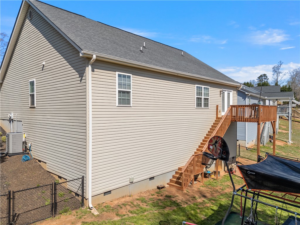 2520 Linmar Circle Anderson, SC 29621 - Photo 41 of 50 A spacious backyard features a multi-level deck for seamless outdoor entertaining.