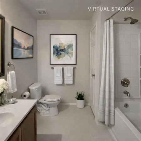 a bathroom with a toilet a sink and a bathtub