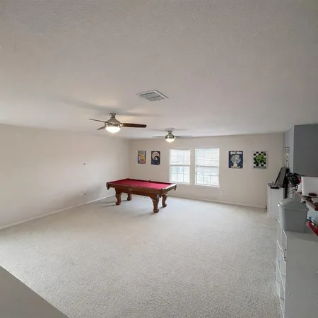 a room with furniture and window