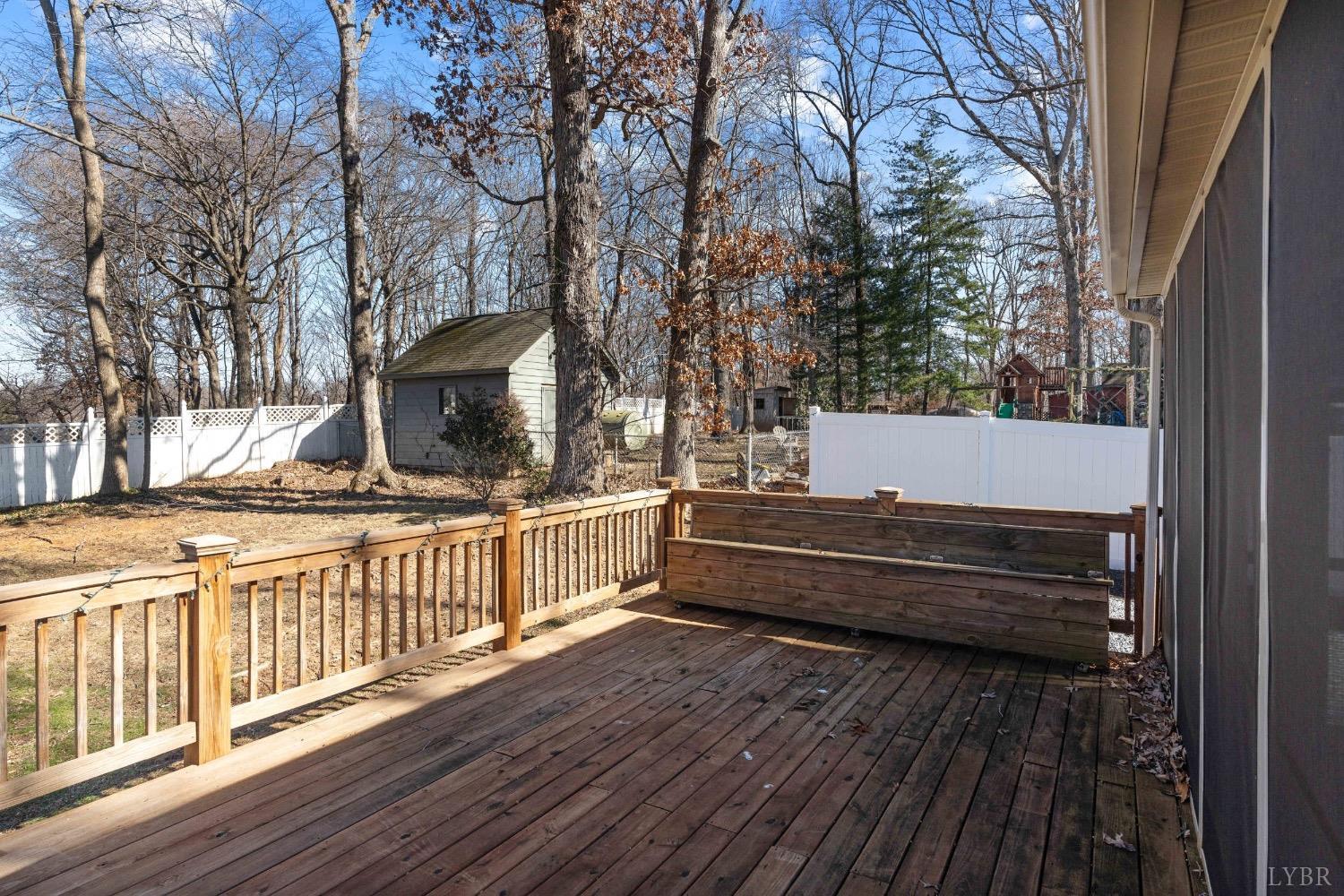 311 Bob Circle Forest, VA 24551 - Photo 24 of 61 a view of a roof deck with wooden floor and fence