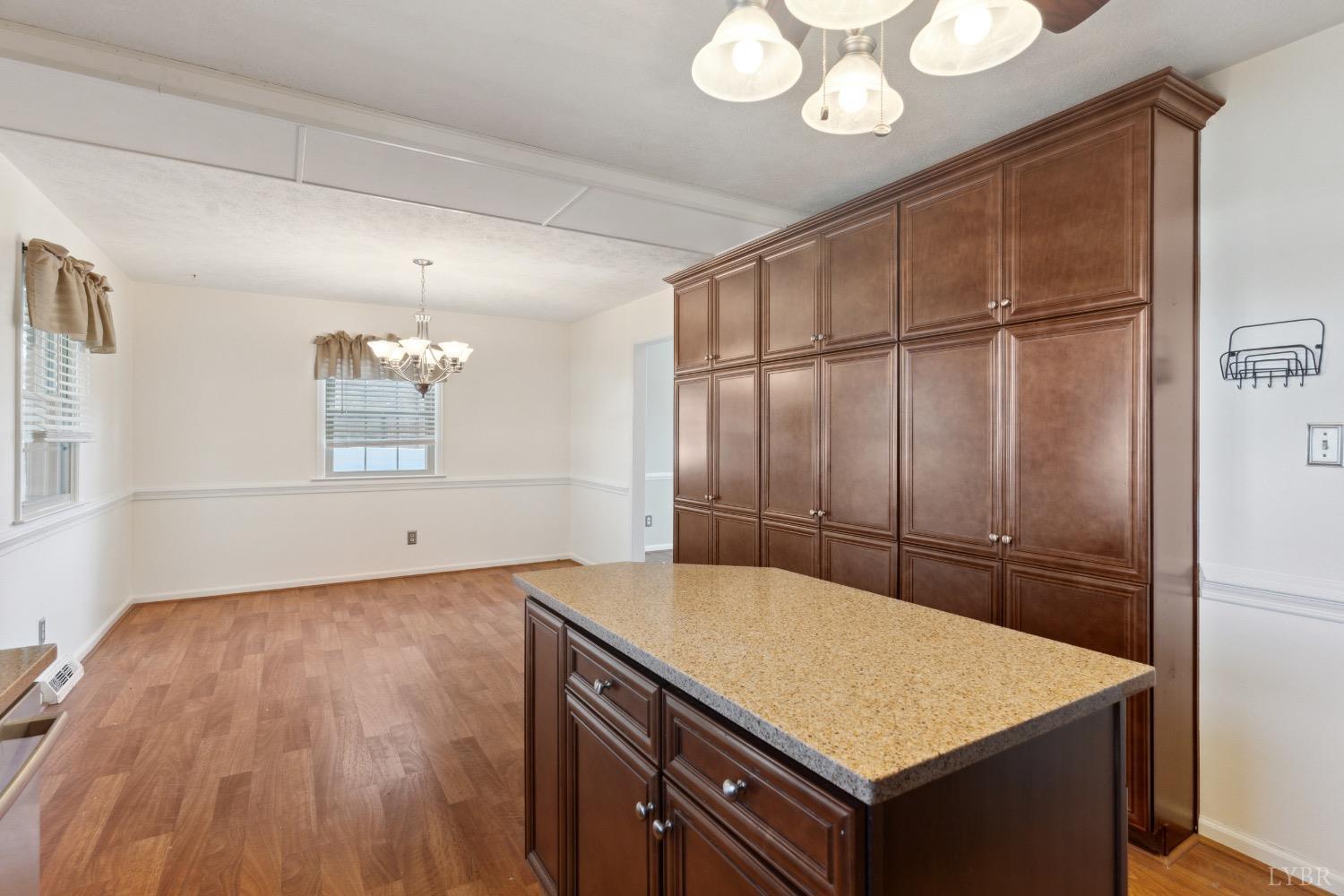 311 Bob Circle Forest, VA 24551 - Photo 30 of 61 a kitchen with a wooden floor and window