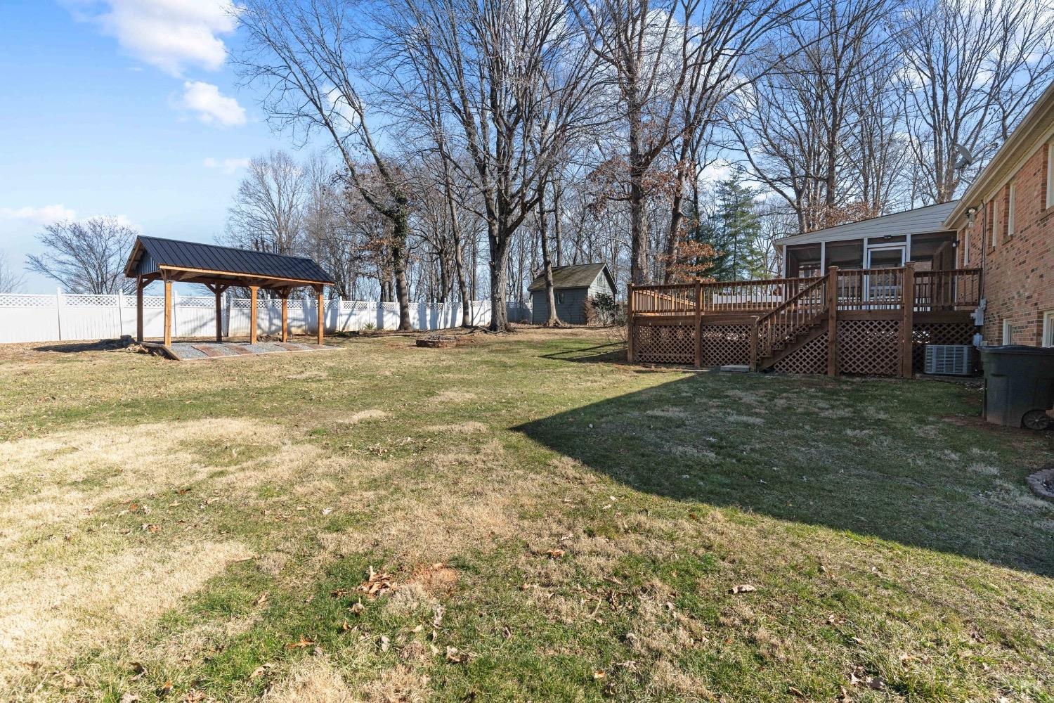 311 Bob Circle Forest, VA 24551 - Photo 3 of 61 a view of a yard with a house and a large tree