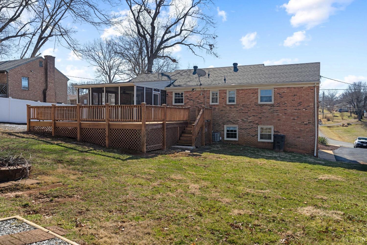311 Bob Circle Forest, VA 24551 - Photo 36 of 61 a view of a yard in front of a house with a large tree