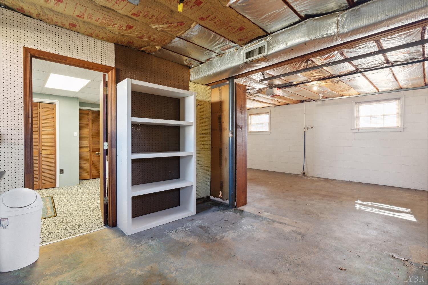 311 Bob Circle Forest, VA 24551 - Photo 52 of 61 a view of an empty room with a cabinet and a window