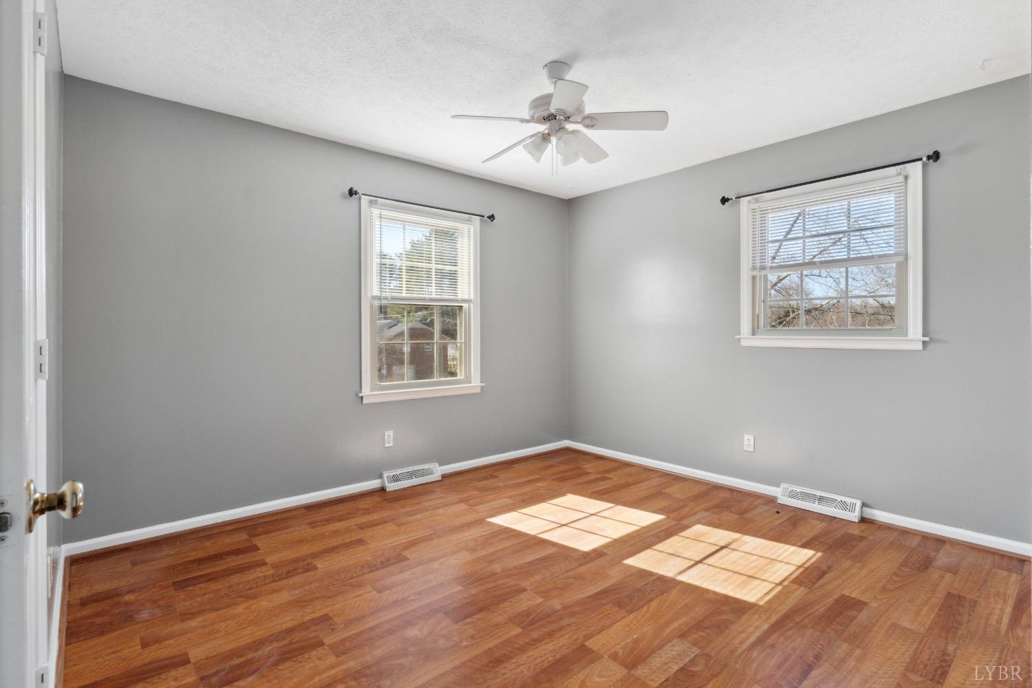311 Bob Circle Forest, VA 24551 - Photo 54 of 61 a view of an empty room with window and wooden floor