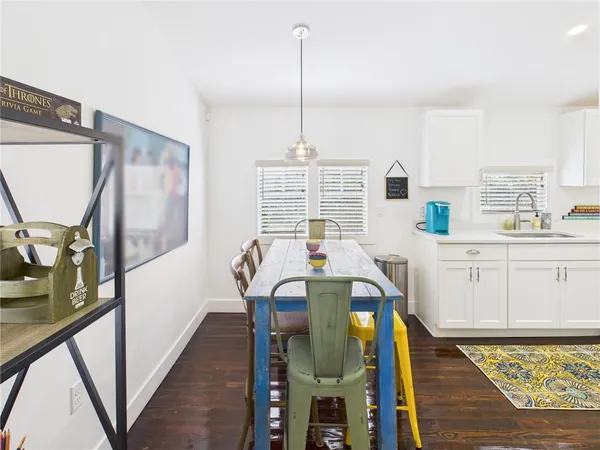 a bathroom with a sink and mirror