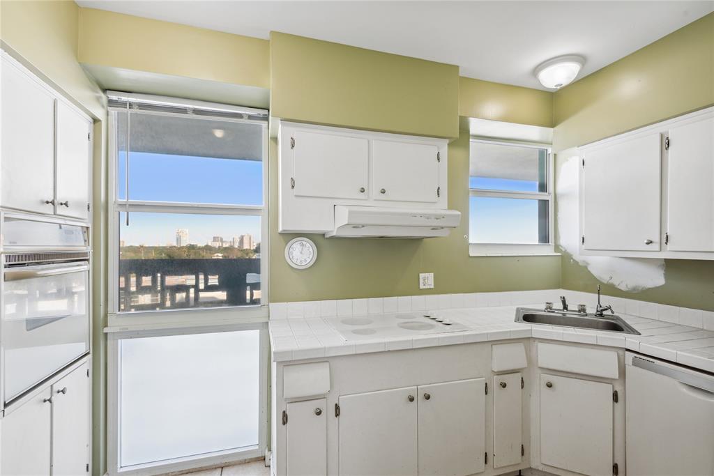 1900 South Ocean Drive, Unit 604 Fort Lauderdale, FL 33316 - Photo 8 of 33 Bright kitchen with impact windows, dishwasher (5 years old) fridge (1 year old) garbage disposal (1 year old).
