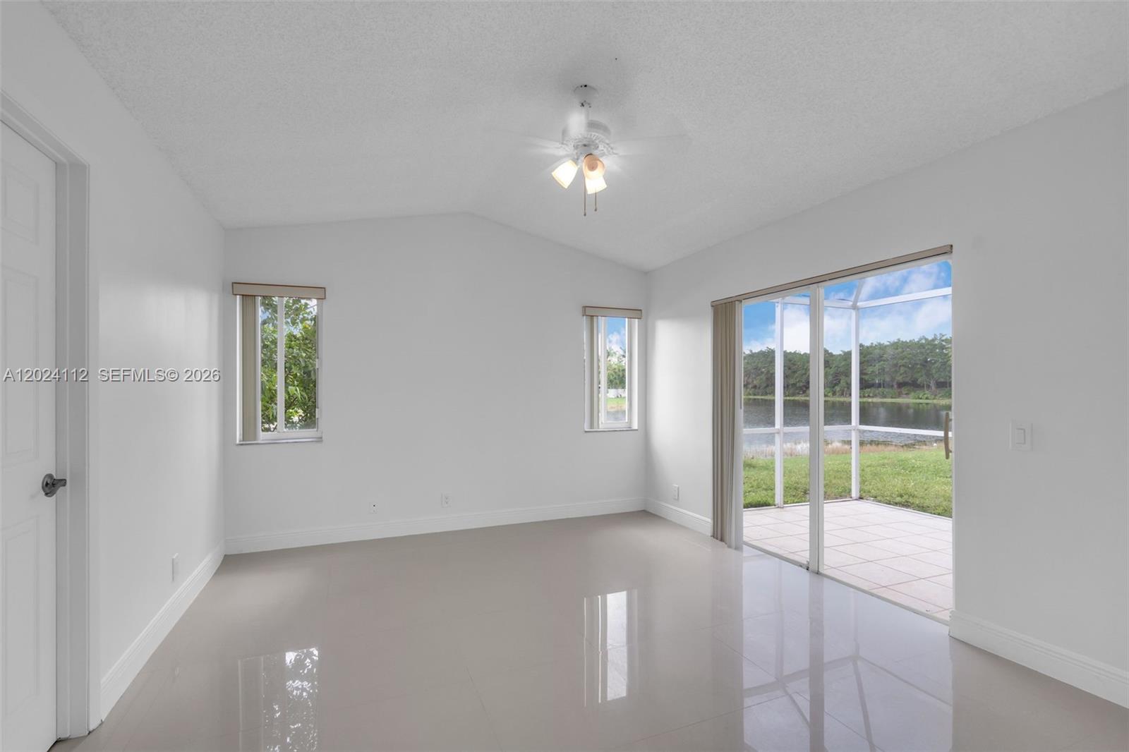 4366 Mahogany Ridge Drive Weston, FL 33331 - Photo 12 of 41 a view of an empty room with a window