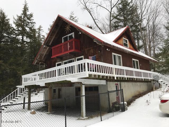 a view of a house with a roof deck
