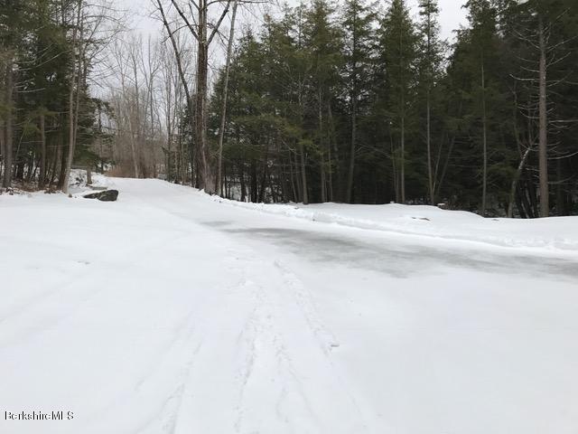 389 Sandmill Road Cheshire, MA 01225 - Photo 2 of 33 a view of a road with a snow on the road