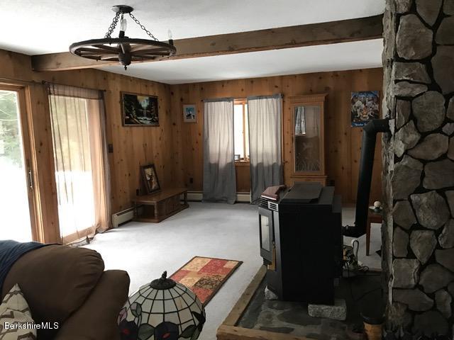 389 Sandmill Road Cheshire, MA 01225 - Photo 11 of 33 a living room with furniture and a window