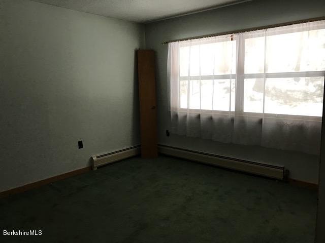 389 Sandmill Road Cheshire, MA 01225 - Photo 13 of 33 a view of an empty room with a window