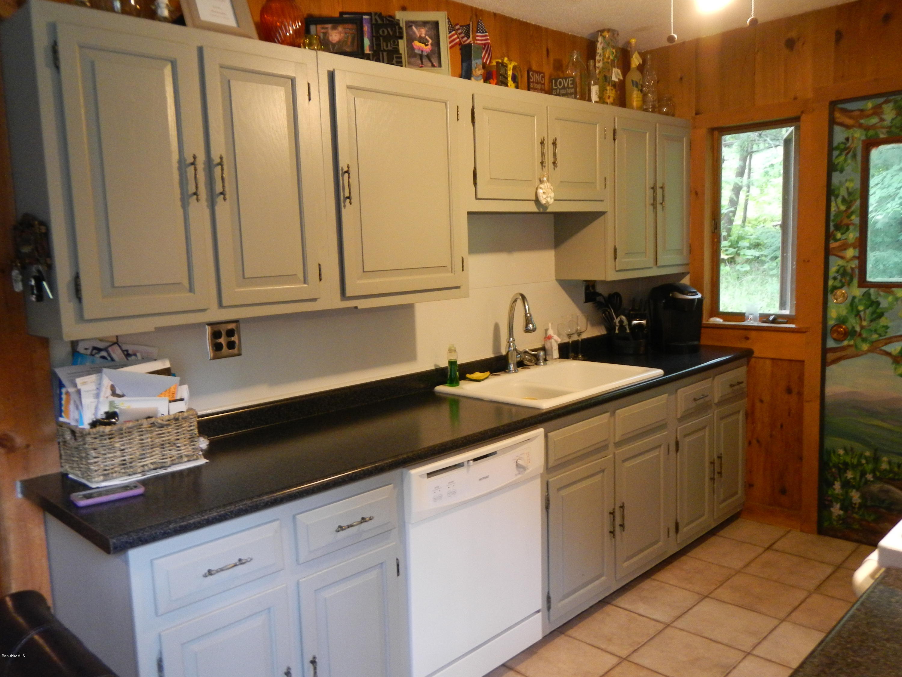 389 Sandmill Road Cheshire, MA 01225 - Photo 3 of 33 a kitchen with stainless steel appliances granite countertop a sink and cabinets