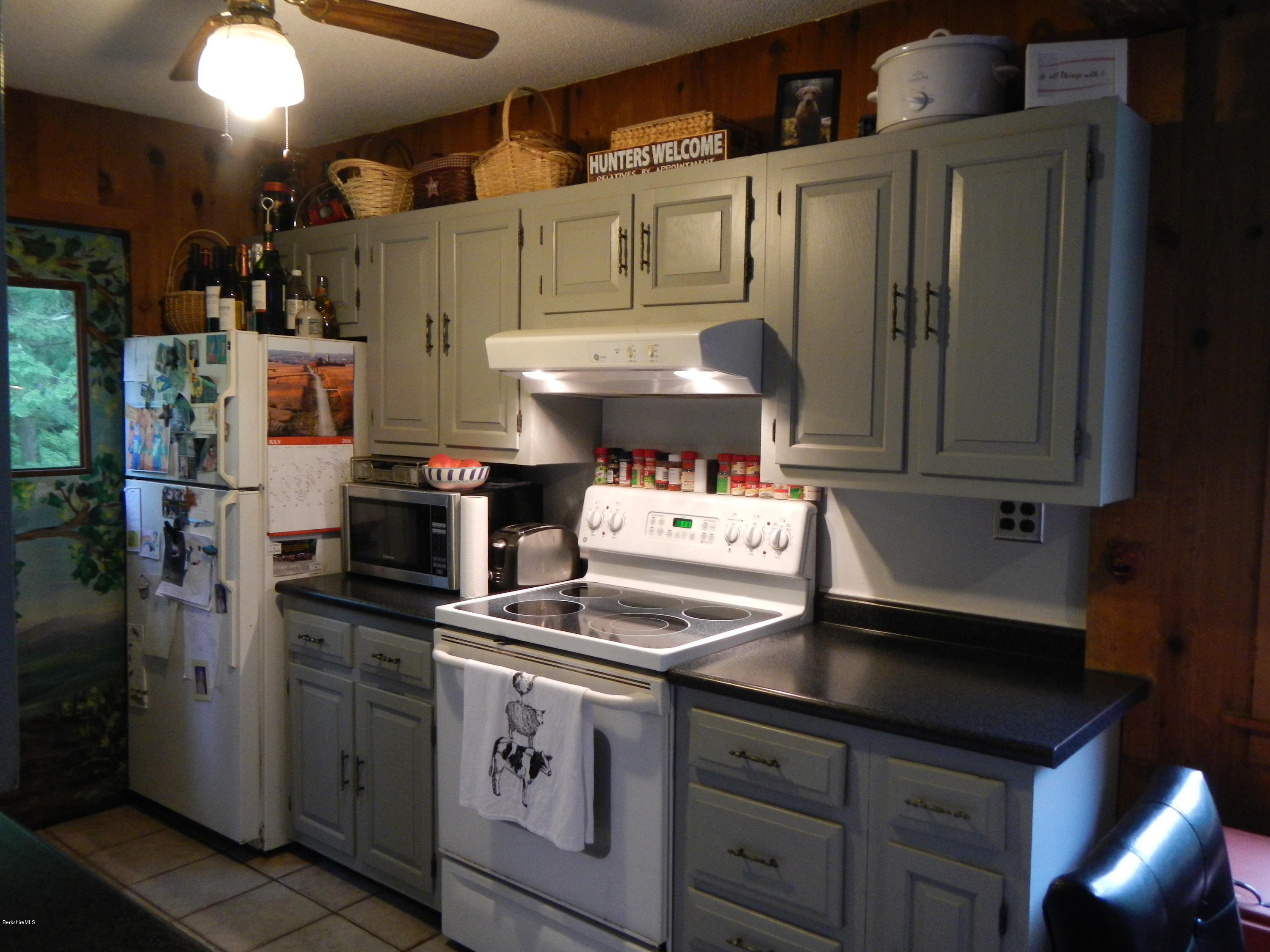 389 Sandmill Road Cheshire, MA 01225 - Photo 4 of 33 a kitchen with stainless steel appliances granite countertop a refrigerator and a stove