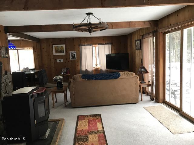 389 Sandmill Road Cheshire, MA 01225 - Photo 10 of 33 a living room with furniture and a window