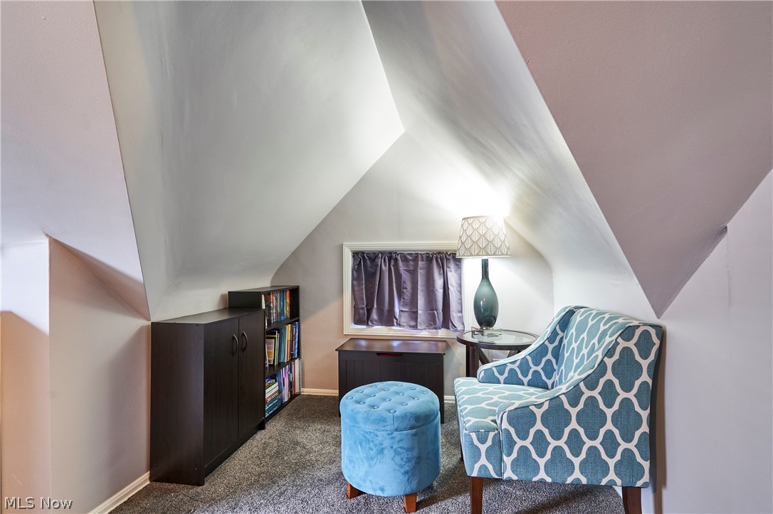 28322 Forest Road Willowick, OH 44095 - Photo 22 of 32 2nd Floor Master Sitting room with vaulted ceiling and dark colored carpet