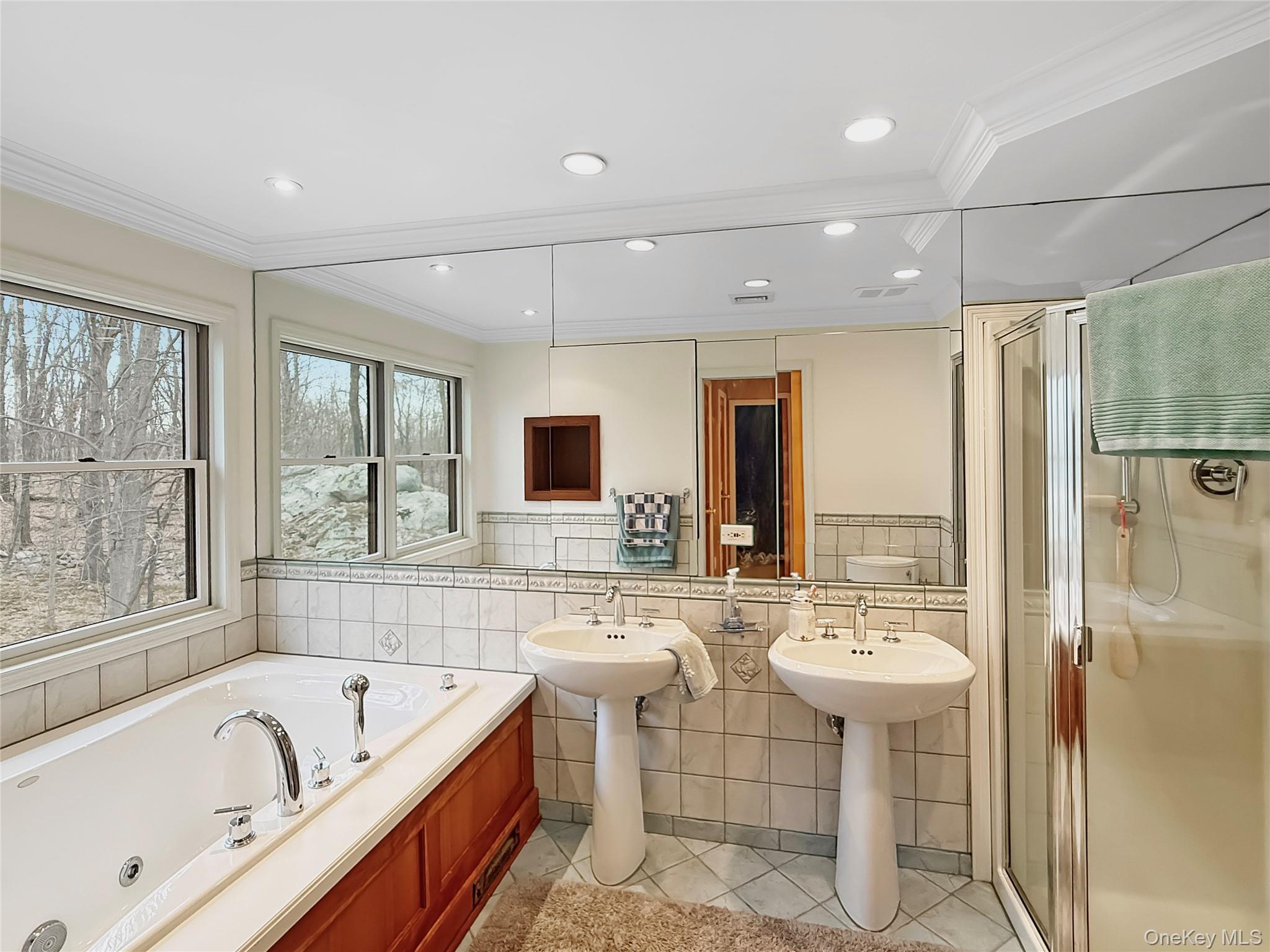 101 Travis Corners Road Garrison, NY 10524 - Photo 9 of 13 Bathroom with soaking tub, shower and double vanity
