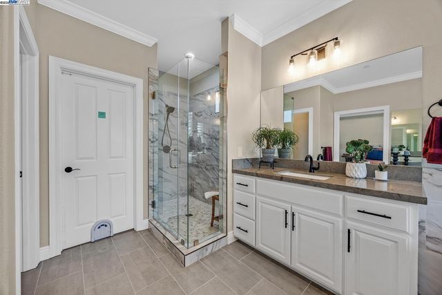 a bed room with furniture and a fireplace